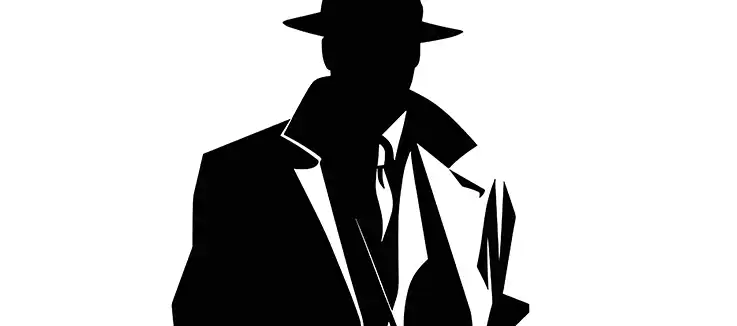 black and white silhouette of a gangster in a suit, overcoat and hat